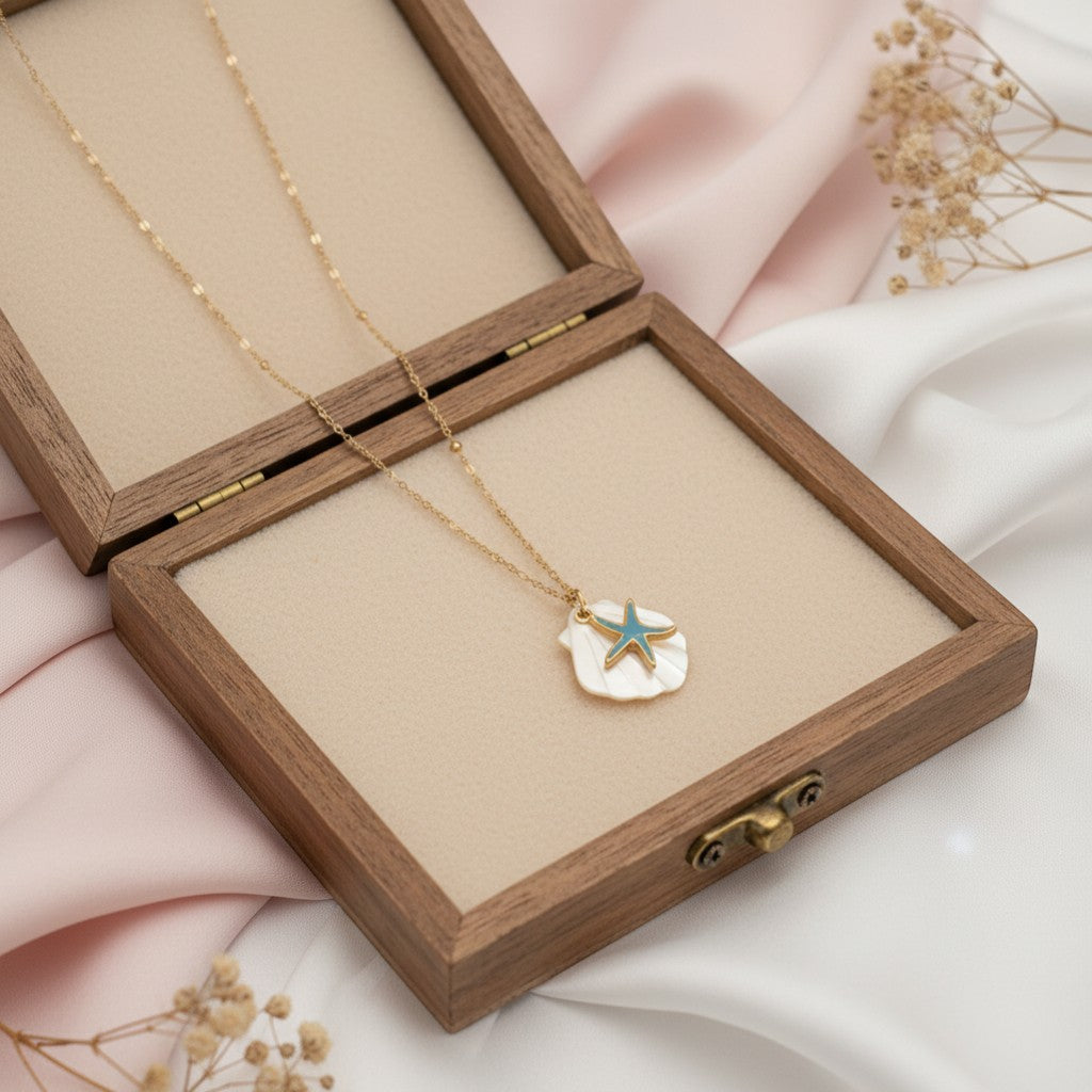 Nivi short chain with star in a shell
