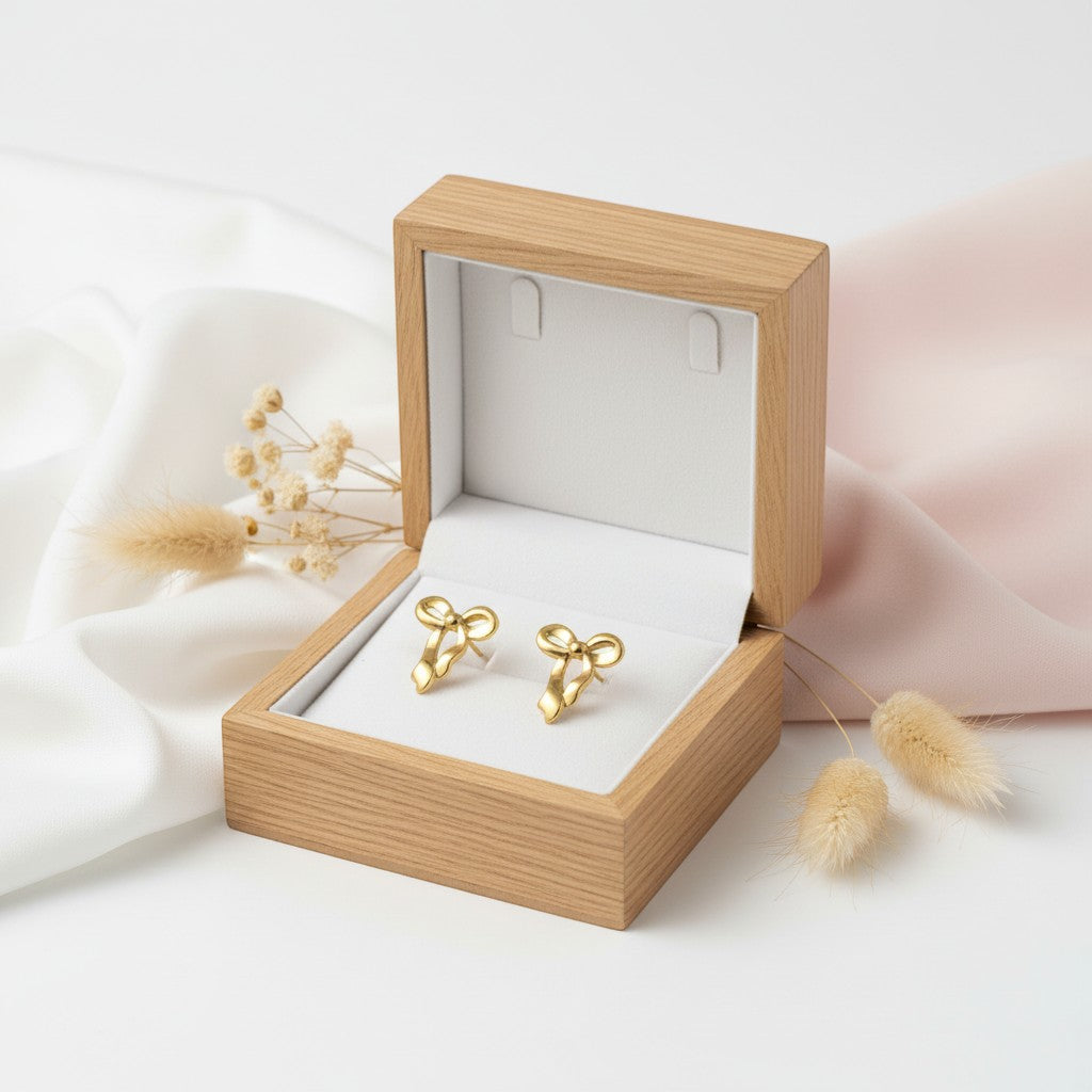 Bima hollow bow earring