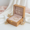 tira twisted hooped earring with pearl