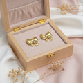 Buva solid bow earrings